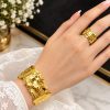 A glossy, golden, crumpled-texture jewellery set to bring out a regal elegance in your look (1)
