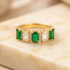 vibrant gold ring adorned with colorful gemstones,